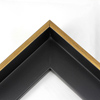 This Medium, L-shaped floating contemporary canvas frame in matte black features a thin brushed gold face.

*Note: These solid wood, custom canvas floaters are for stretched canvas prints and paintings, and raised wood panels.